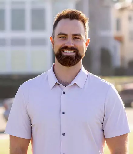 Phot Of Erick In Front Of A House